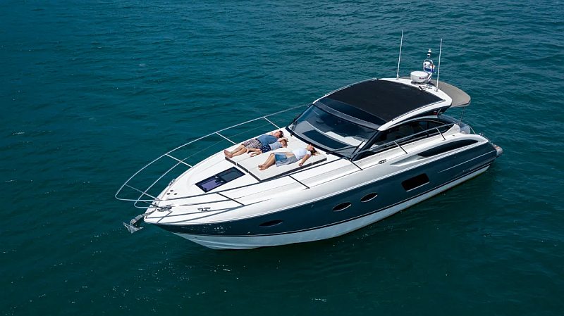Princess V39 sport yacht with sunbeds for private charter in Phuket, Thailand