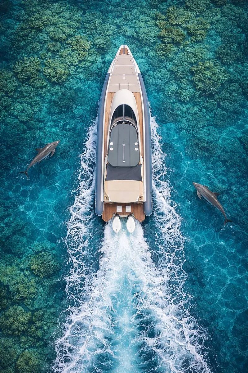 Prince 38 high-performance RIB speedboat cutting through waves near Phuket Thailand